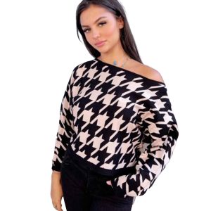 Afbeelding van zwart taupe houndstooth trui oversized.