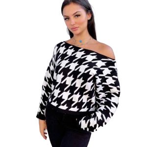Afbeelding van zwart wit houndstooth trui oversized.